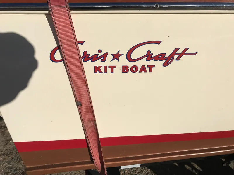 Slide: The Image of 1954 Chris-Craft kit boat with red strap, vintage design. - 2