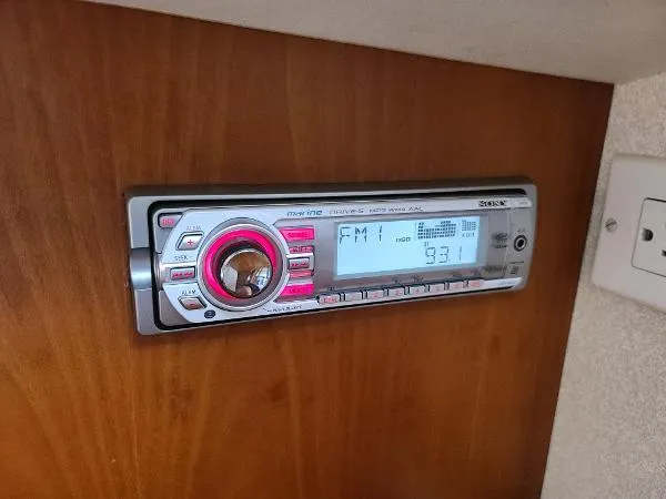 Slide: The Image of Built-in stereo system in a 1995 Silverton 34 Aft Cabin Motor Yacht. - 26