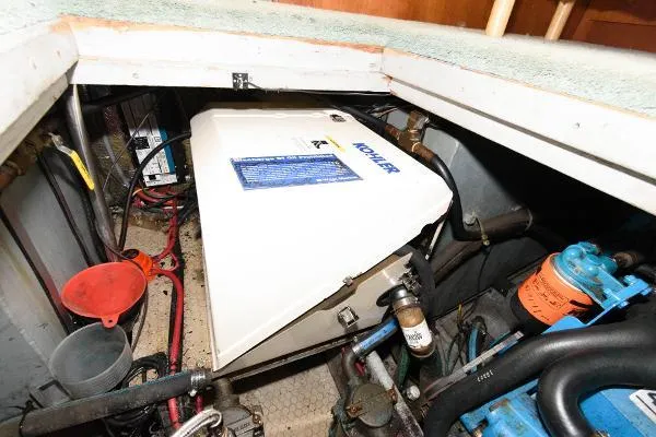 Slide: The Image of Engine room of a 1995 Silverton 34 Aft Cabin Motor Yacht with Kohler generator. - 35