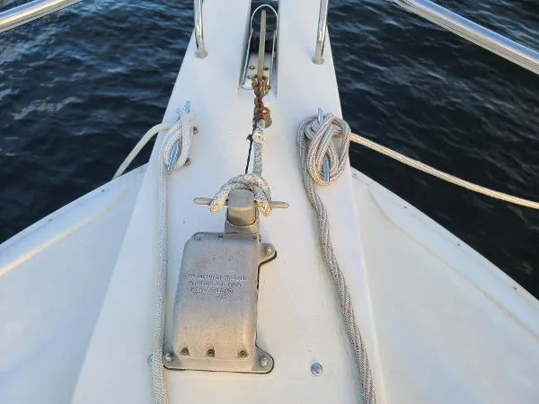 Slide: The Image of Bow of 1995 Silverton 34 Aft Cabin Motor Yacht with anchor and ropes. - 6