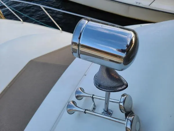 Slide: The Image of Close-up of a 1995 Silverton 34 Aft Cabin Motor Yacht's chrome horn. - 7
