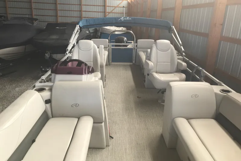 Slide: The Image of 2022 Avalon VENTURE QUAD LOUNGE pontoon boat with spacious seating in storage. - 16