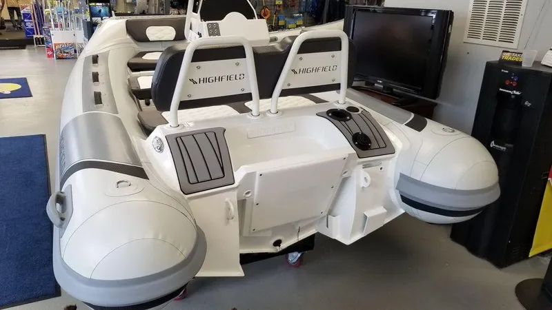 Slide: The Image of 2023 Highfield Classics inflatable boat displayed indoors. - 3