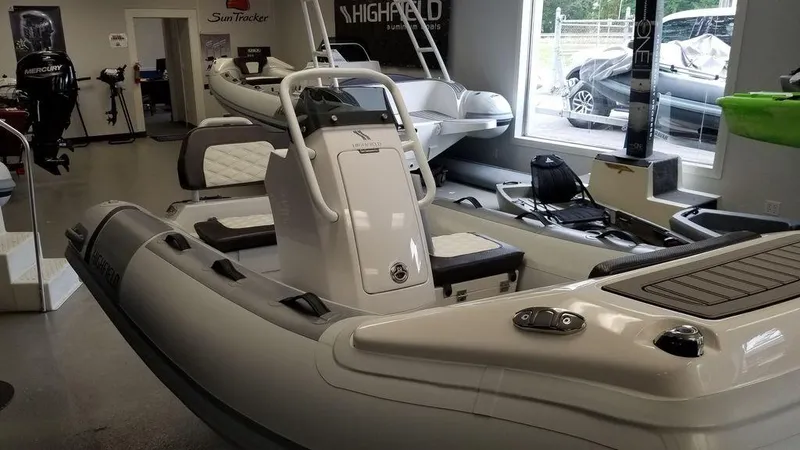 Slide: The Image of 2023 Highfield Classics inflatable boat displayed in showroom. - 4