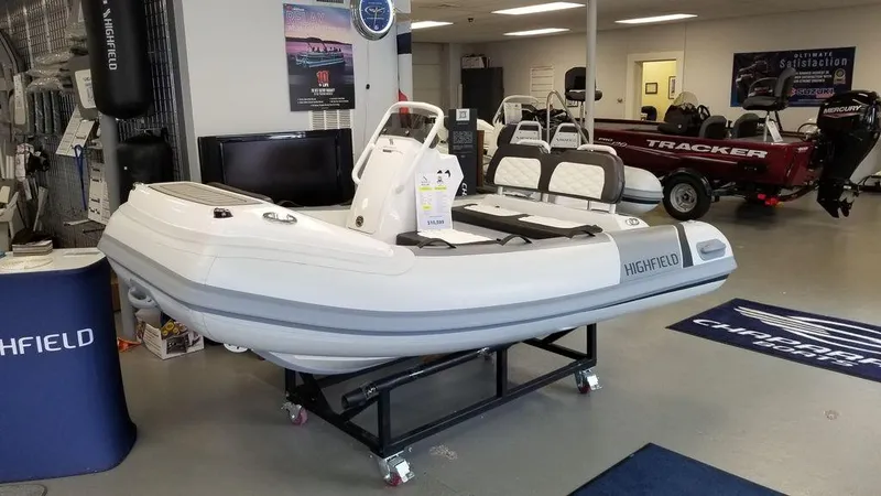 Slide: The Image of 2023 Highfield Classics inflatable boat displayed in a showroom. - 5