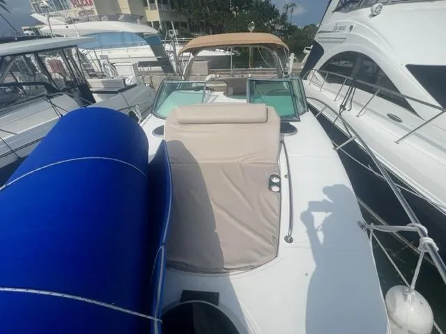 Slide: The Image of Schaefer 365 yacht, 2018 model, docked with blue cover and sunshade. - 15