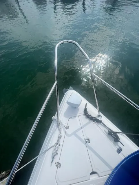 Slide: The Image of Bow of 2018 Schaefer 365 yacht on calm water. - 16