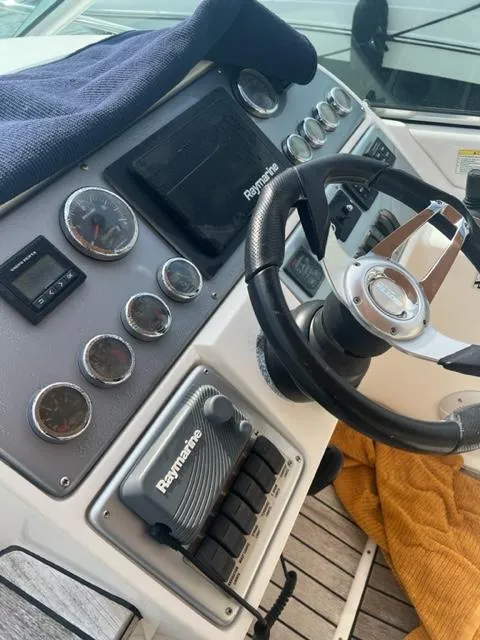 Slide: The Image of Control panel of a 2018 Schaefer 365 boat with Raymarine electronics. - 24