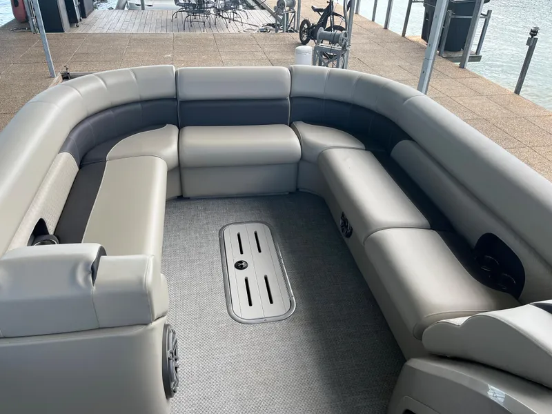 Slide: The Image of 2022 Premier 250 SunSation RL pontoon boat with spacious seating and modern design. - 4