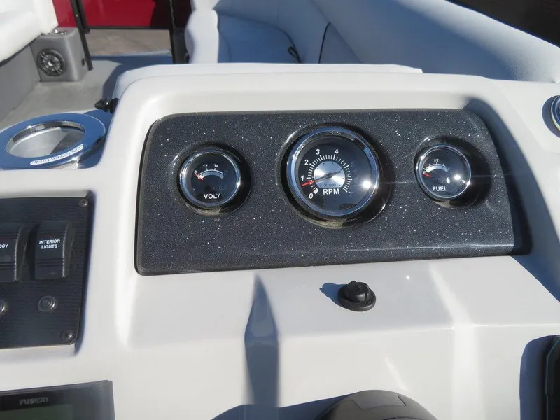 Slide: The Image of 2022 Crest Classic Fish 200 SF boat dashboard with RPM, voltage, and fuel gauges. - 17