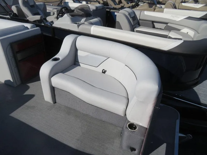 Slide: The Image of 2022 Crest Classic Fish 200 SF boat interior with cushioned seating. - 4