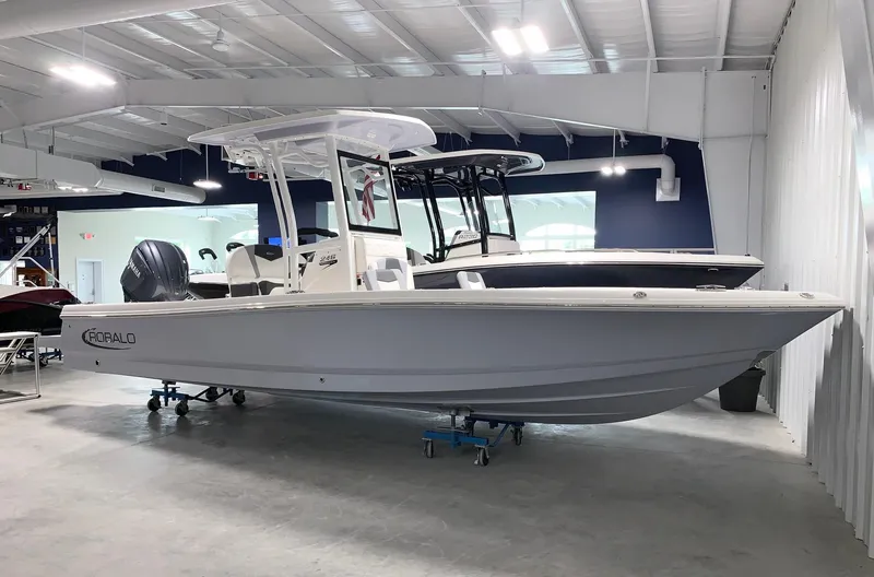 The Image of 2024 Robalo 246 Cayman boat in showroom, side view. - 0