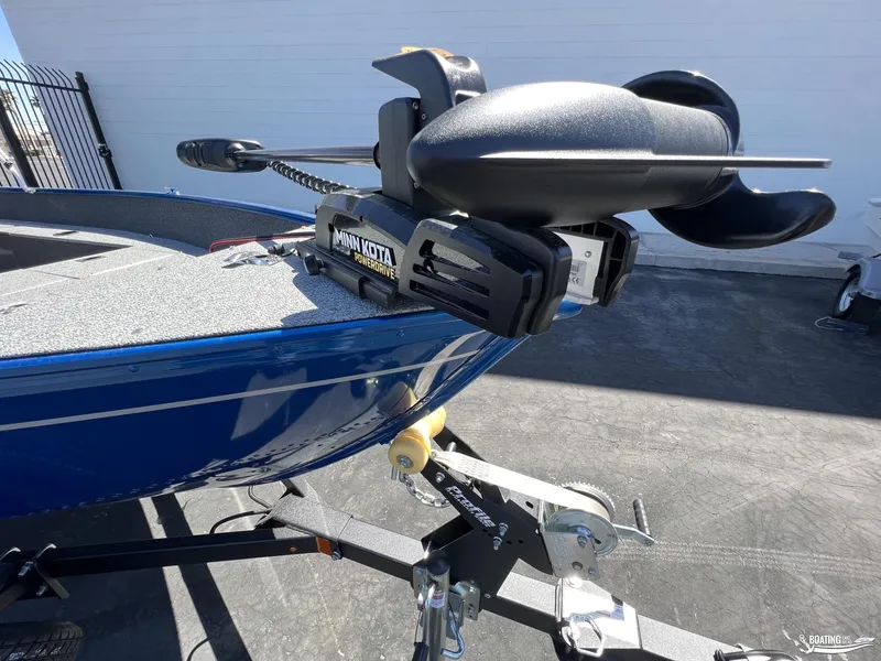 Slide: The Image of 2022 Lund 1650 Angler SS with Minn Kota PowerDrive trolling motor on trailer. - 2