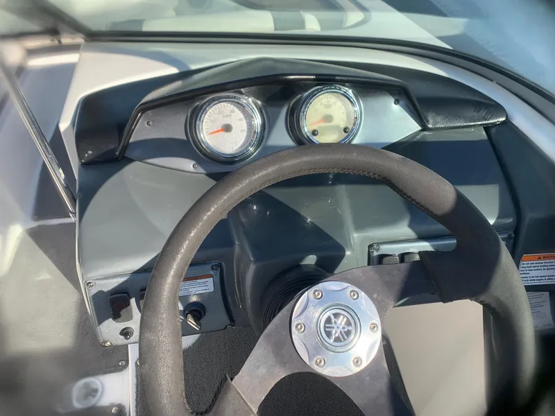 Slide: The Image of Steering wheel and dashboard of a 2012 Yamaha Boats SX190. - 5