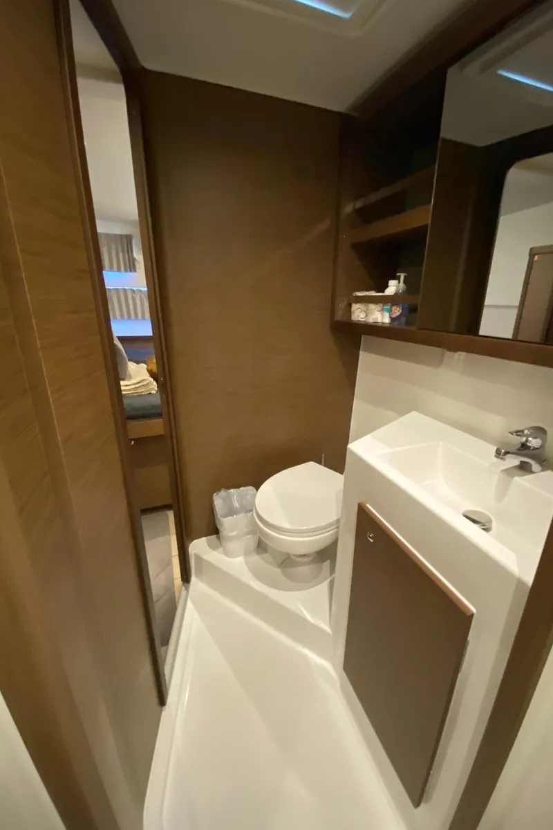 Slide: The Image of Modern bathroom in 2022 Lagoon 42 yacht with sleek design and compact amenities. - 20