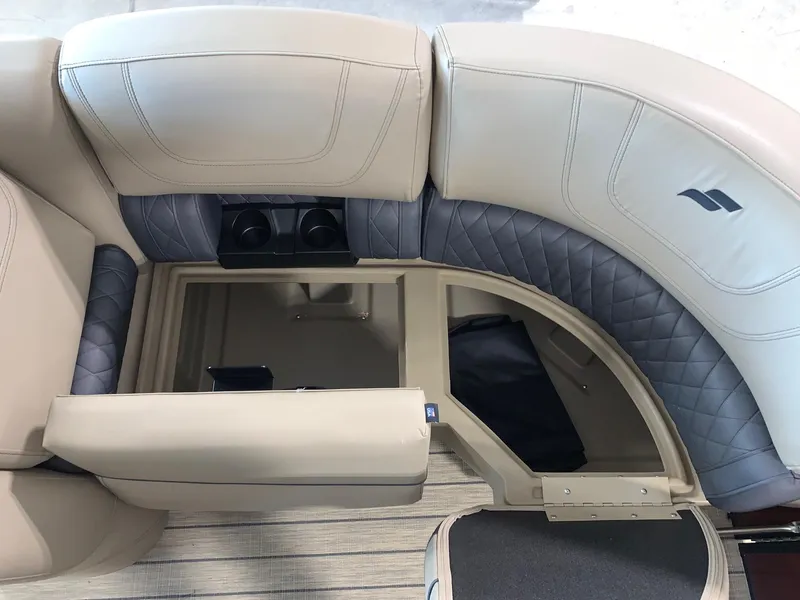 Slide: The Image of 2024 Starcraft SLS 3 Q DH boat interior with beige and gray seating. - 11