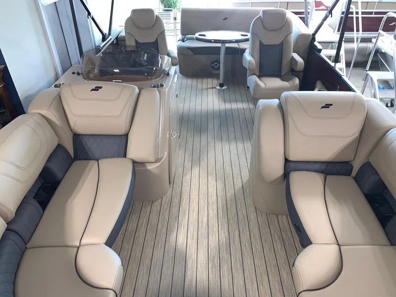 Slide: The Image of 2024 Starcraft SLS 3 Q DH boat interior with luxurious seating and modern design. - 9