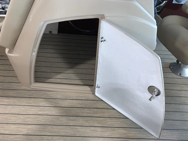 Slide: The Image of Open storage compartment on 2024 Starcraft SLS 3 Q DH boat. - 13