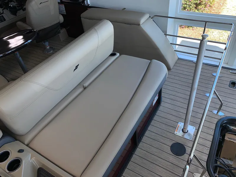 Slide: The Image of 2024 Starcraft SLS 3 Q DH boat interior with beige seating and modern design. - 6