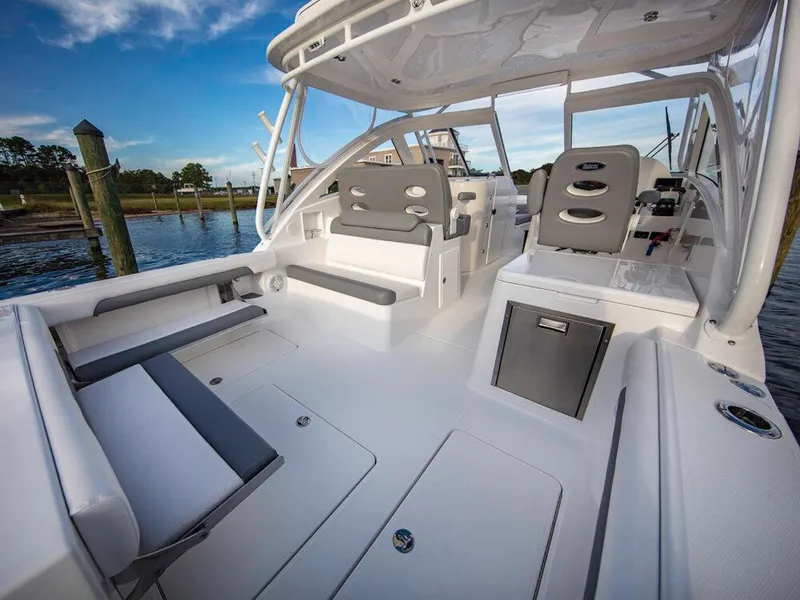 Slide: The Image of 2025 Albemarle 31DC boat interior with seating and helm station. - 20