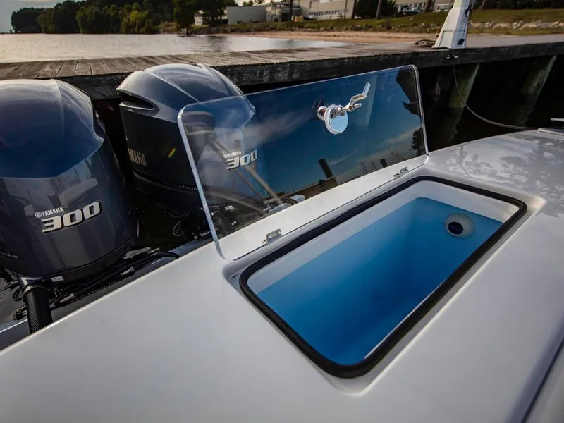 Slide: The Image of 2025 Albemarle 31DC boat with Yamaha 300 engines at dock. - 29