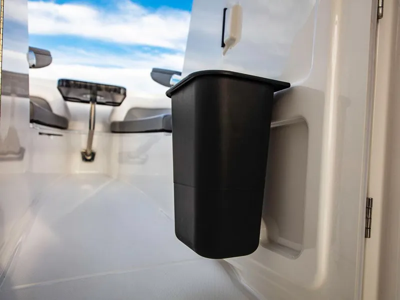 Slide: The Image of 2025 Albemarle 31DC interior with seating and storage bin. - 33