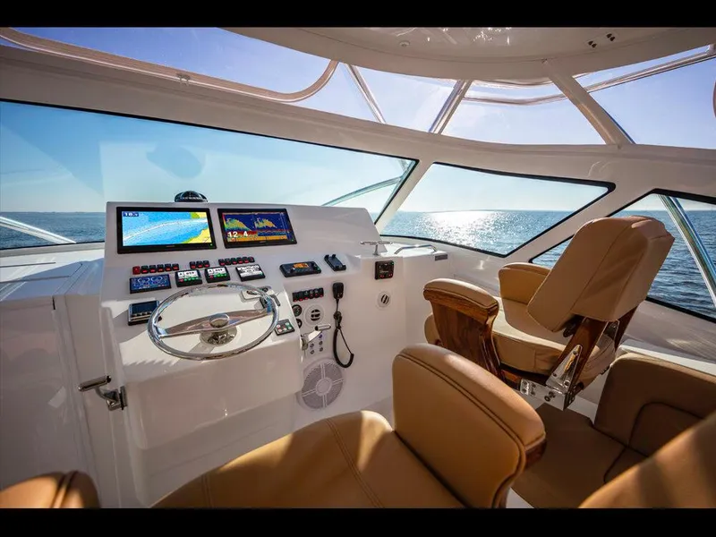 Slide: The Image of 2025 Albemarle 410 Express Fisherman helm with ocean view. - 22