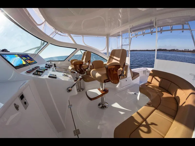 Slide: The Image of Interior of 2025 Albemarle 410 Express Fisherman yacht with luxurious seating and advanced navigation. - 27