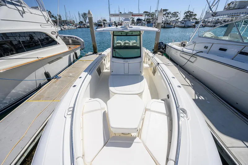 Slide: The Image of Boston Whaler 350 Outrage 2016 docked at marina. - 14