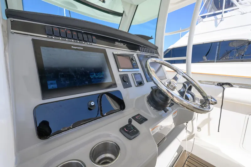Slide: The Image of 2016 Boston Whaler 350 Outrage helm with electronics. - 18