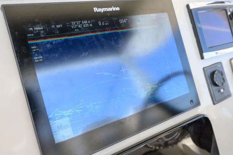 Slide: The Image of Raymarine navigation system on 2016 Boston Whaler 350 Outrage. - 23