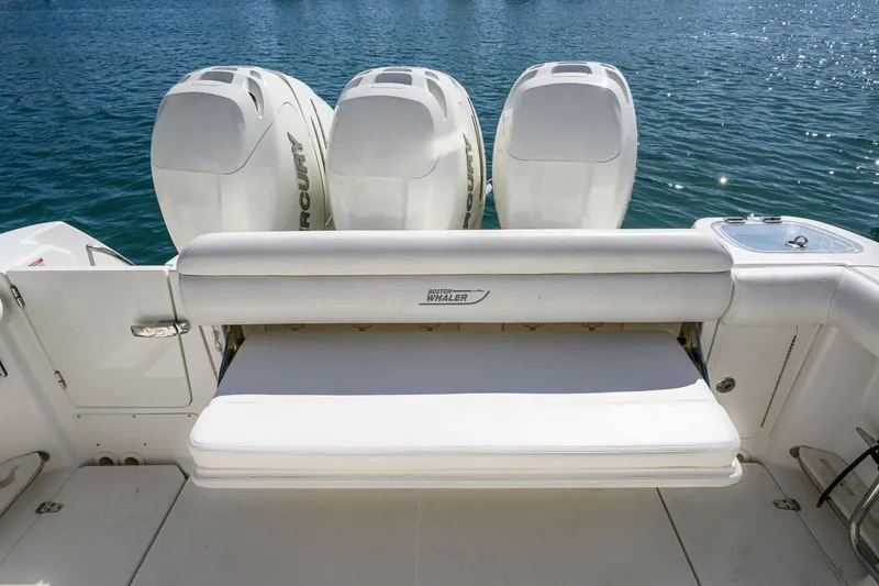 Slide: The Image of 2016 Boston Whaler 350 Outrage with three outboard engines. - 36