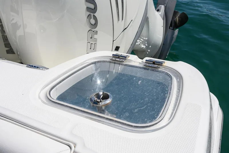 Slide: The Image of Boston Whaler 350 Outrage 2016, deck detail with engine. - 43