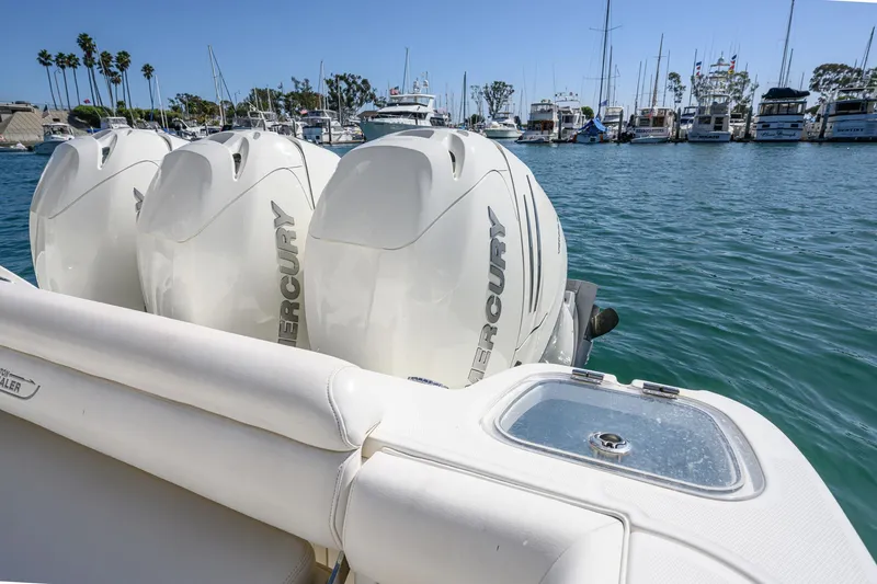 Slide: The Image of Boston Whaler 350 Outrage 2016 with Mercury engines in harbor. - 44