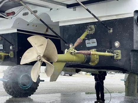 Slide: The Image of Close-up of 2010 Axcell Yachts 650 Power Catamaran propeller and underbody during maintenance. - 15