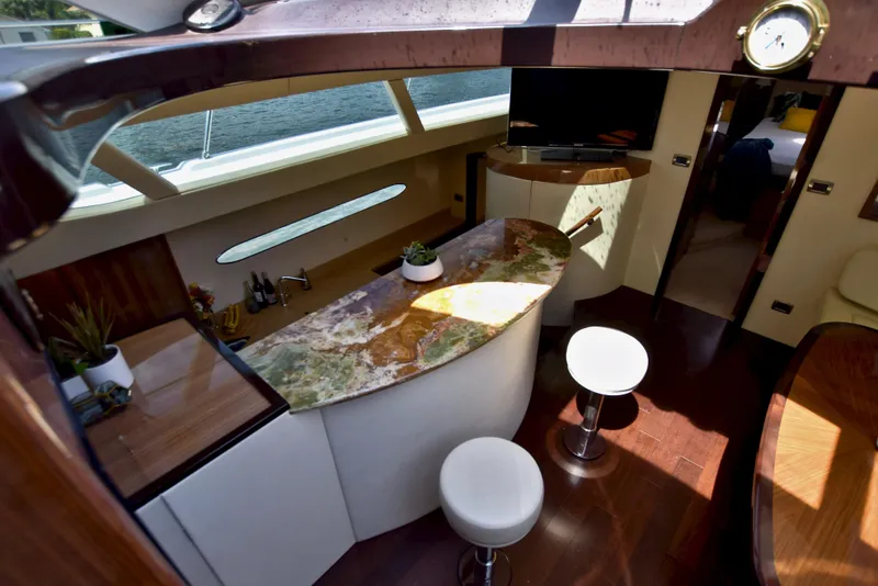 Slide: The Image of Luxurious interior of 2010 Axcell Yachts 650 Power Catamaran with modern bar and seating area. - 23