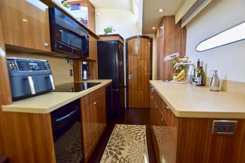 Slide: The Image of Luxurious kitchen interior of 2010 Axcell Yachts 650 Power Catamaran with modern appliances. - 25