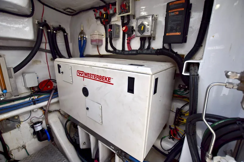 Slide: The Image of Engine room of 2010 Axcell Yachts 650 Power Catamaran with Westerbeke generator. - 31