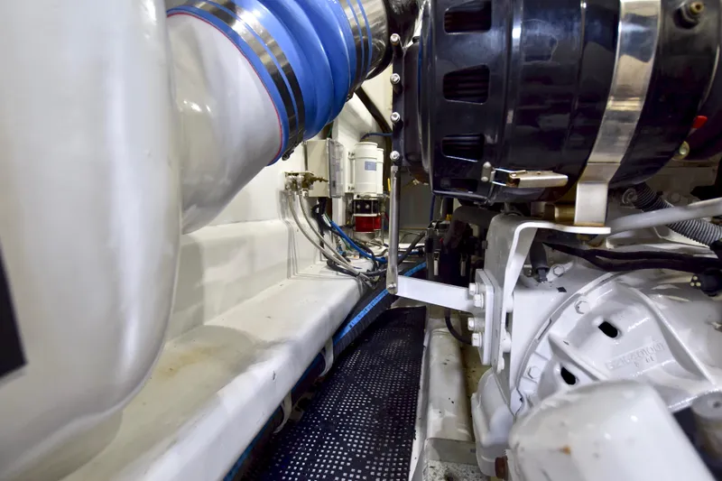 Slide: The Image of Engine room of 2010 Custom Axcell Yachts 650 Power Catamaran, showcasing mechanical components. - 34