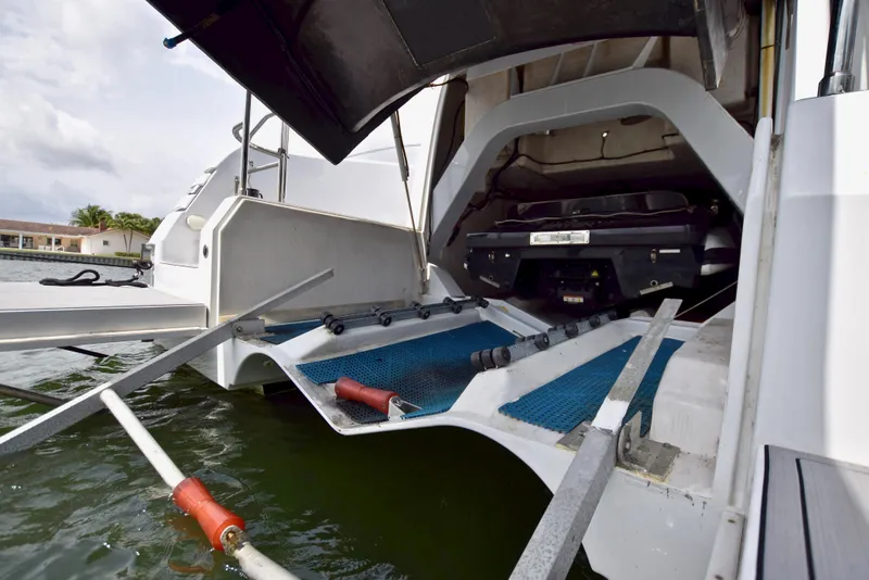 Slide: The Image of Custom Axcell Yachts 650 Power Catamaran, 2010 model, rear view with open engine compartment. - 37