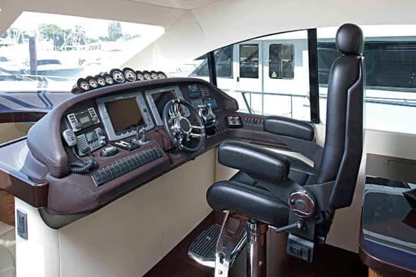 Slide: The Image of Luxurious helm of 2010 Custom Axcell Yachts 650 Power Catamaran with advanced navigation controls. - 7