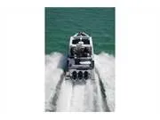 Slide: The Image of 2024 Formula 380 Super Sport Crossover speeding on water, rear view. - 11