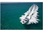 Slide: The Image of 2024 Formula 380 Super Sport Crossover speeding on clear blue ocean waters. - 7