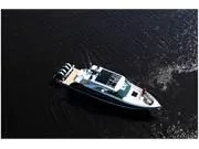 Slide: The Image of 2024 Formula 500 Super Sport Crossover boat cruising on open water. - 14