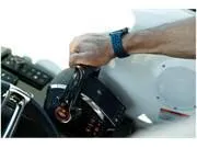Slide: The Image of Hand operating controls on 2024 Formula 500 Super Sport Crossover boat dashboard. - 17