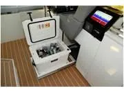 Slide: The Image of 2024 Formula 500 Super Sport Crossover interior with open cooler and control panel. - 23