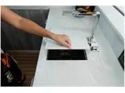 Slide: The Image of 2024 Formula 500 Super Sport Crossover sink area with modern faucet and countertop. - 28
