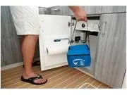 Slide: The Image of 2024 Formula 500 Super Sport Crossover interior with storage compartment and blue cooler. - 30