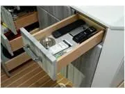 Slide: The Image of Open drawer in 2024 Formula 500 Super Sport Crossover, containing remote controls and miscellaneous items. - 31