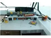 Slide: The Image of 2024 Formula 500 Super Sport Crossover interior with snacks and drinks on the counter. - 37